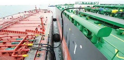 Bunker hose rigged between two vessels during a ship to ship delivery